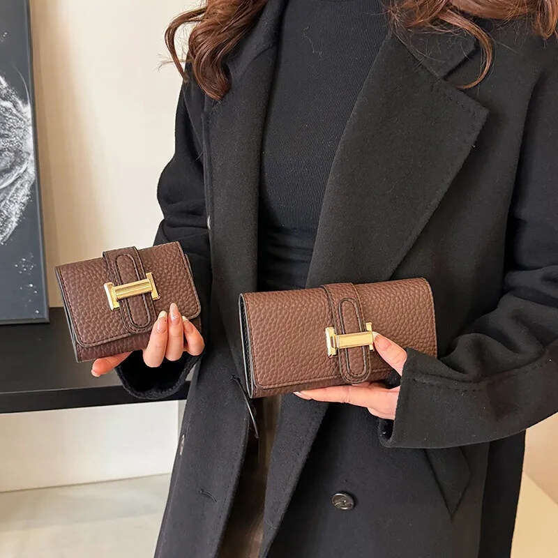 Luxury hand held women's long large capacity trifold multi card holder multifunctional short luxury fashionable retro men's wallet handbag