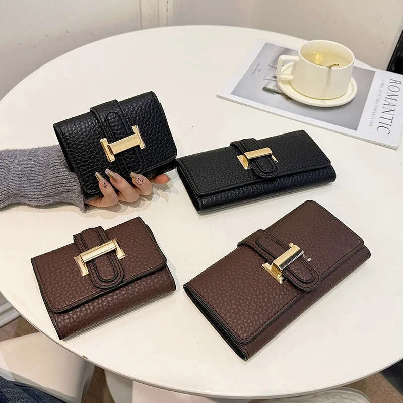 Luxury hand held women's long large capacity trifold multi card holder multifunctional short luxury fashionable retro men's wallet handbag