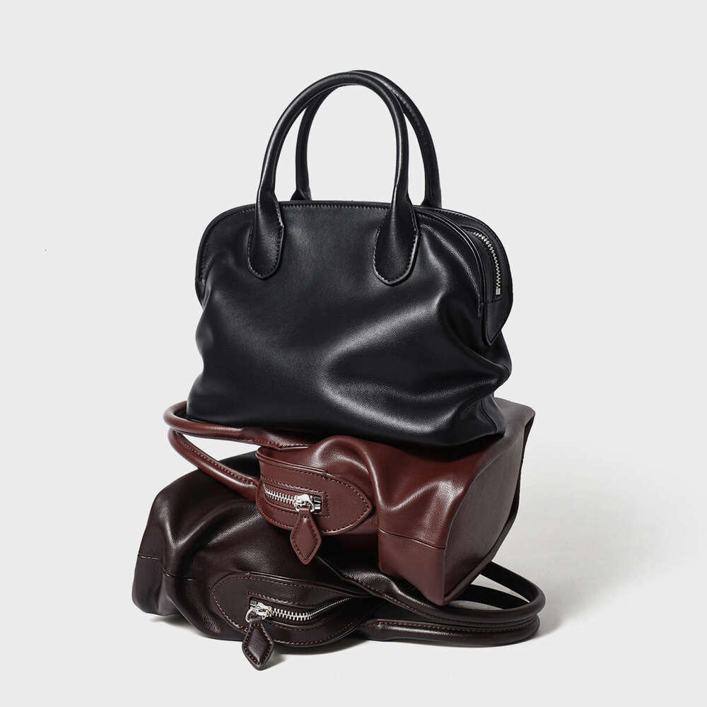 Niche design retro cowhide fashion shell handbag versatile new style genuine leather large capacity shoulder and handbag SENYY