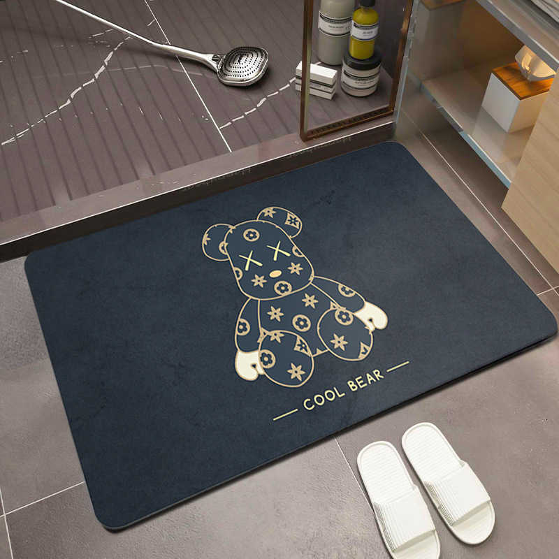 Super absorbent bathroom floor mat for the toilet room made of silaite. Features cartoon design, anti-slip property, dirt resistance and dark color.T2 - view 5