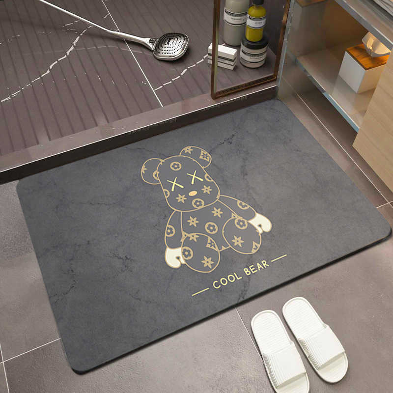 Super absorbent bathroom floor mat for the toilet room made of silaite. Features cartoon design, anti-slip property, dirt resistance and dark color.T2 - view 4