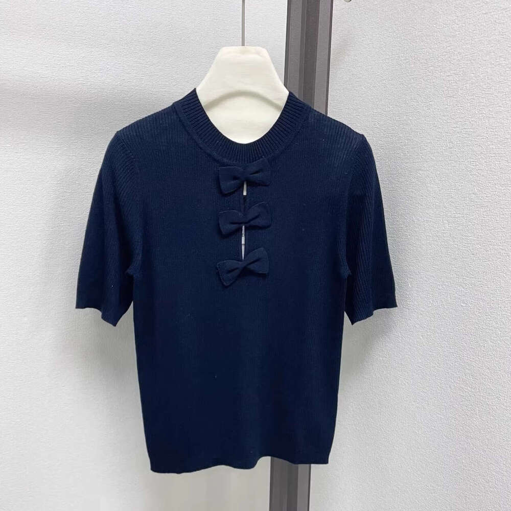 Designer's high-end small fragrance style bow short sleeved k30 2026 spring/summer new pure desire hollowed out slim knit top