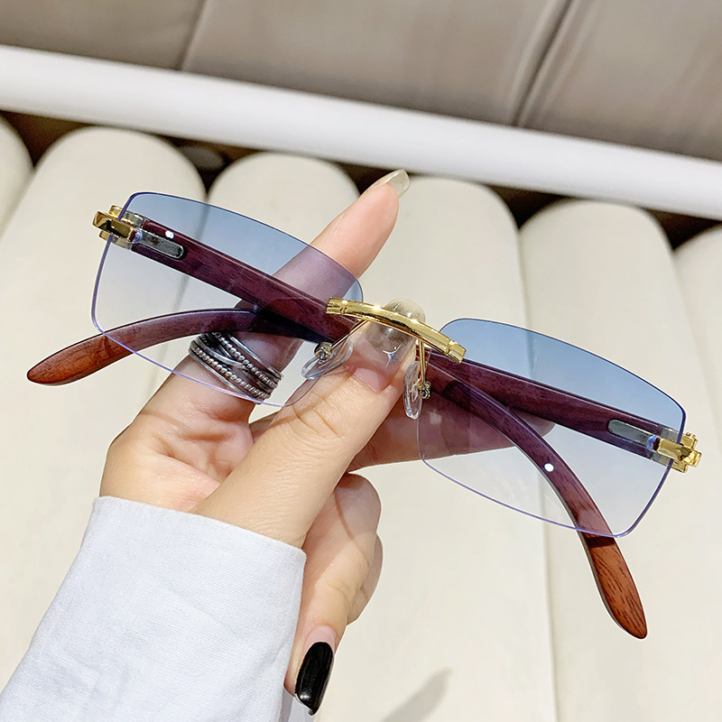 Designer sunglasses New frameless cut-edge personalized sunscreen for fashion shows travel, stylish and versatile women's sunglasses with wood gr