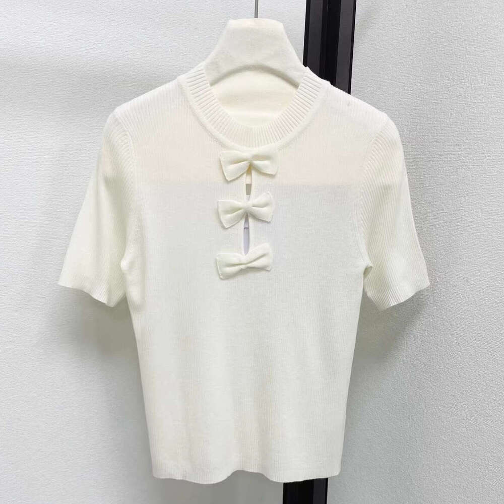 Designer's high-end small fragrance style bow short sleeved k30 2026 spring/summer new pure desire hollowed out slim knit top