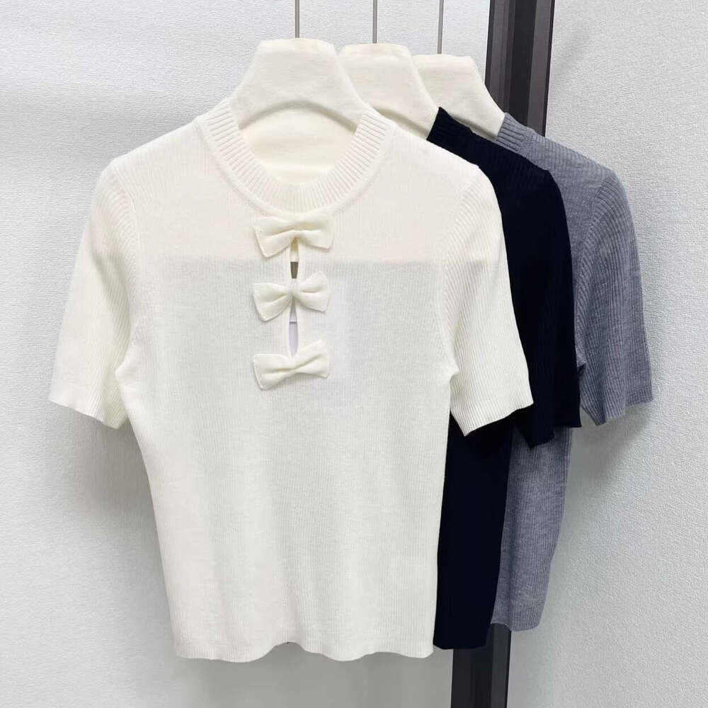 Designer's high-end small fragrance style bow short sleeved k30 2026 spring/summer new pure desire hollowed out slim knit top