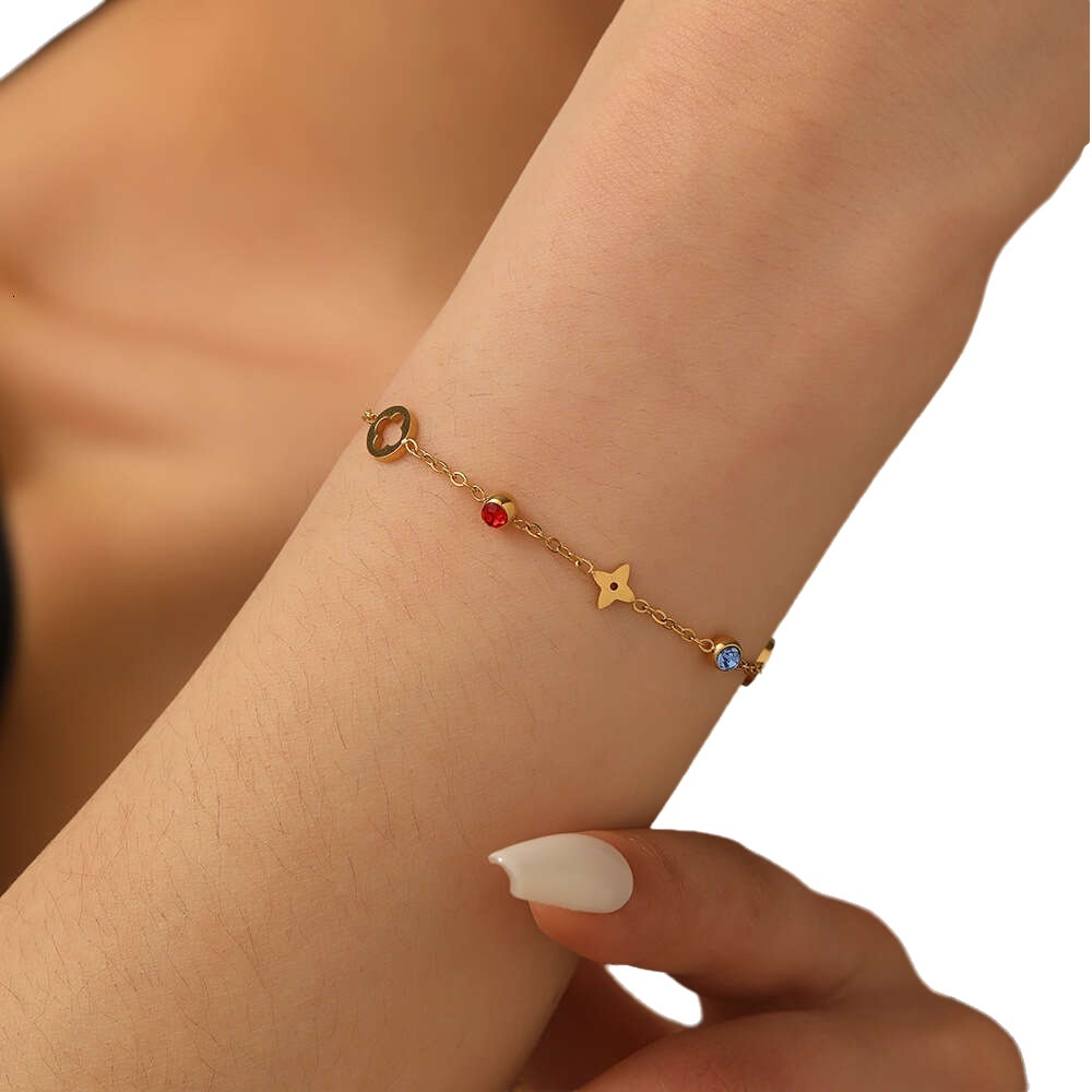 Design Diamond Four-leaf Flower Bracelet For Women Niche Inlaid With Colorful Diamonds Light Luxury 18K