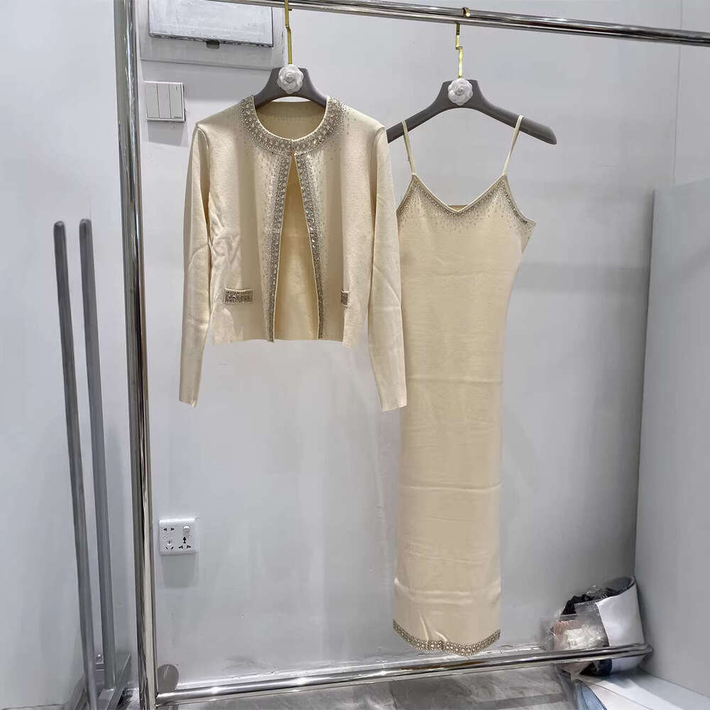 High quality designer niche style rhinestone decoration buttonless long sleeved thin knitted cardigan+women's k30 vest long skirt two-piece set