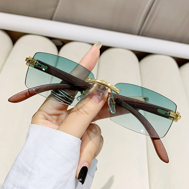 Designer sunglasses New frameless cut-edge personalized sunscreen for fashion shows travel, stylish and versatile women's sunglasses with wood gr