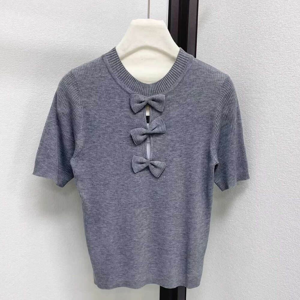 Designer's high-end small fragrance style bow short sleeved k30 2026 spring/summer new pure desire hollowed out slim knit top