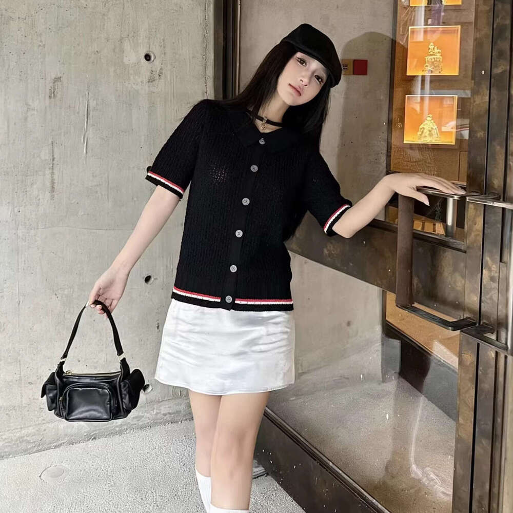 Designer High end Academy Style Fashionable Age reducing Dog Design Collar Short sleeved Knitted k30 Women's Cardigan Top