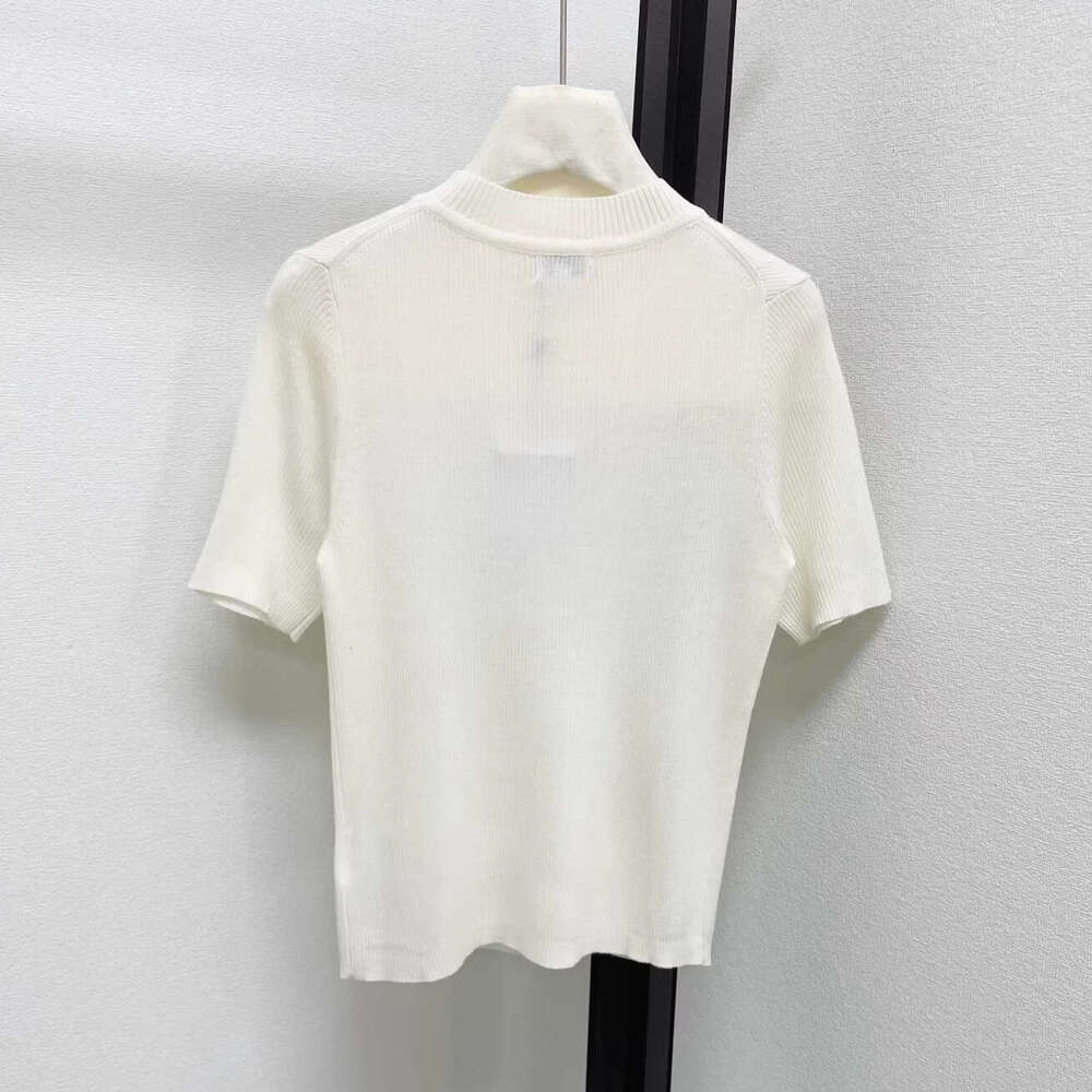 Designer's high-end small fragrance style bow short sleeved k30 2026 spring/summer new pure desire hollowed out slim knit top