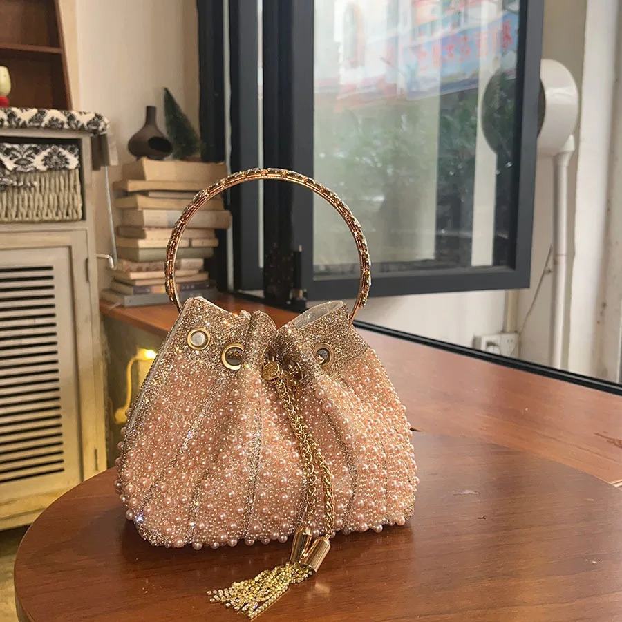 French simple pearl bucket bag Chinese diamond-encrusted strap shoulder bag Niche high-end messenger bag 260402
