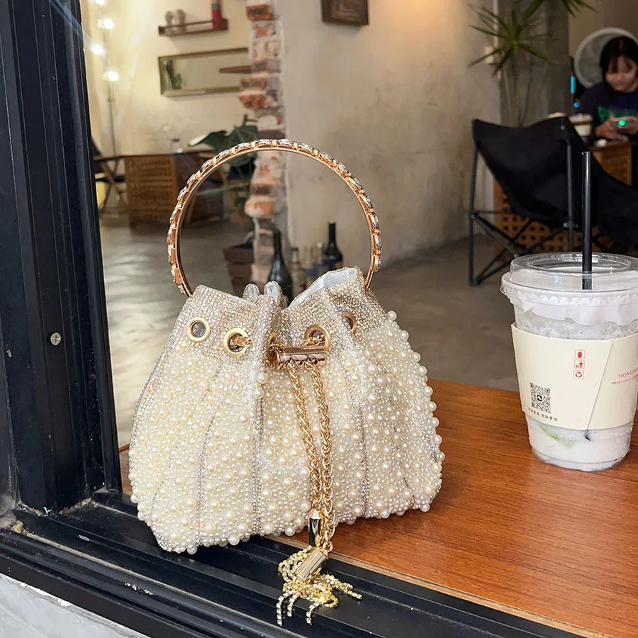 French simple pearl bucket bag Chinese diamond-encrusted strap shoulder bag Niche high-end messenger bag 260402