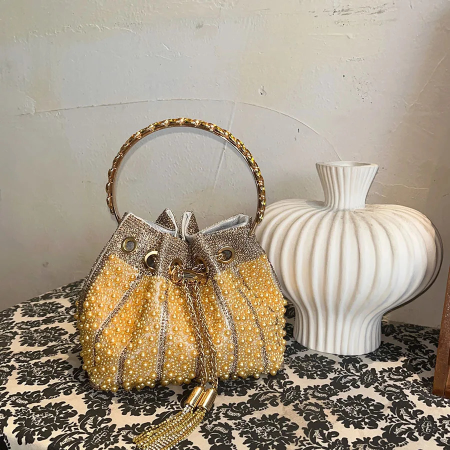 French simple pearl bucket bag Chinese diamond-encrusted strap shoulder bag Niche high-end messenger bag 260402