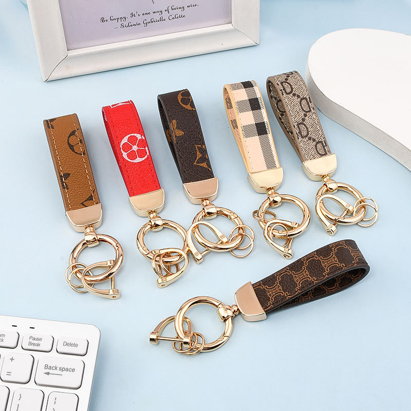Cat's Eye Stone Four-Leaf Clover Fashionable Keychain Handbag Accessory Car Ornament Trendy Fashion Accessory