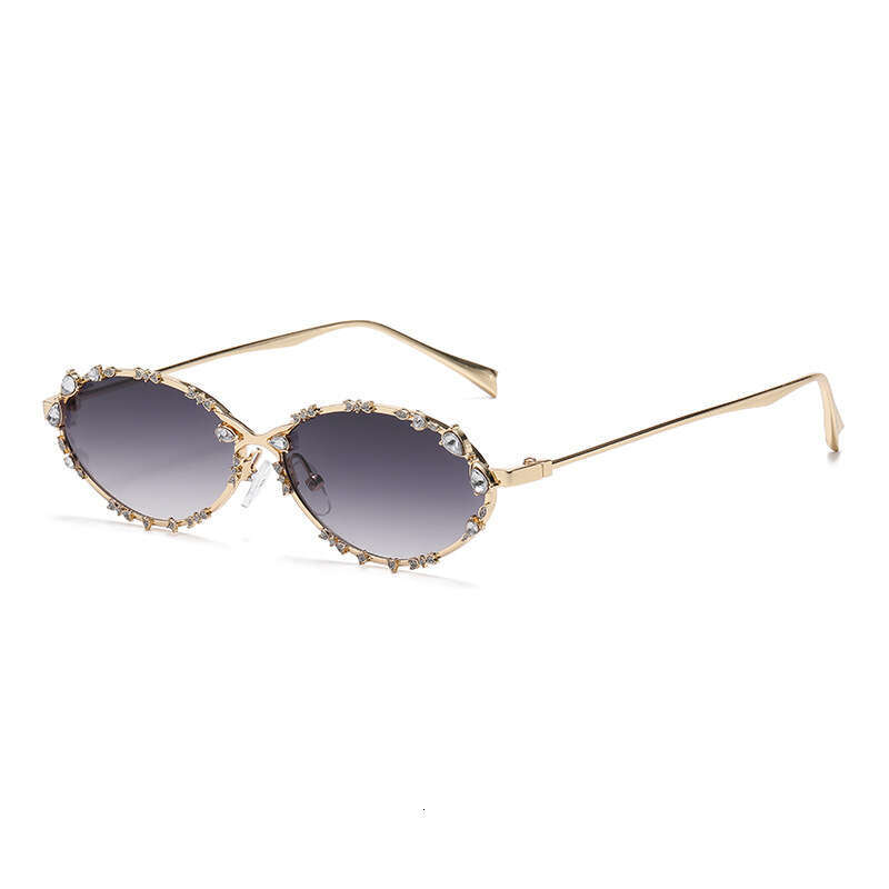 Stylish elegant diamond-embellished women's with metal oval frame, fashionable sunglasses for street photography and sun protection
