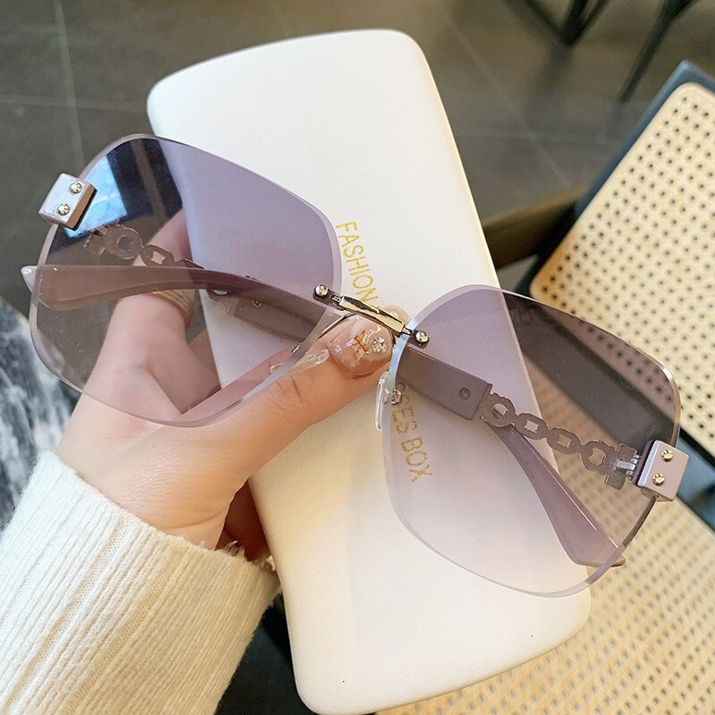 Designer Luxury New Fashionable Frameless Sunglasses With Chains Women's Sunglasses Vintage Large Frame Sunglasses High End UV Protective Sunglas