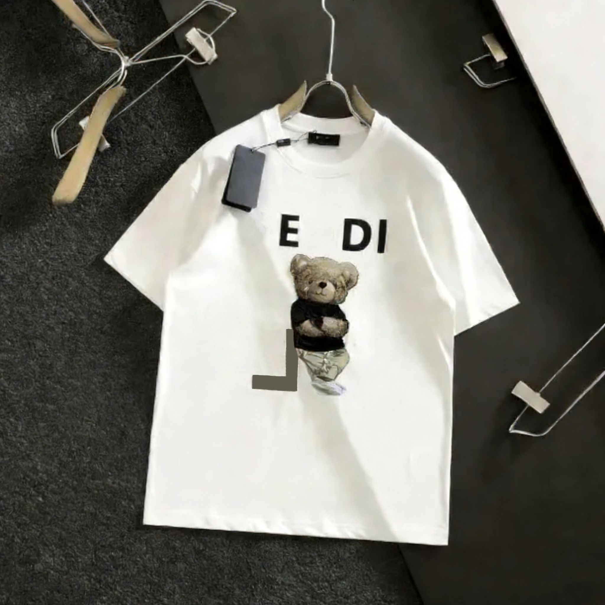 The new summer men's short-sleeve T-shirt is a fashionable designer piece that embodies multifunctionality blending style with trendy casual wear