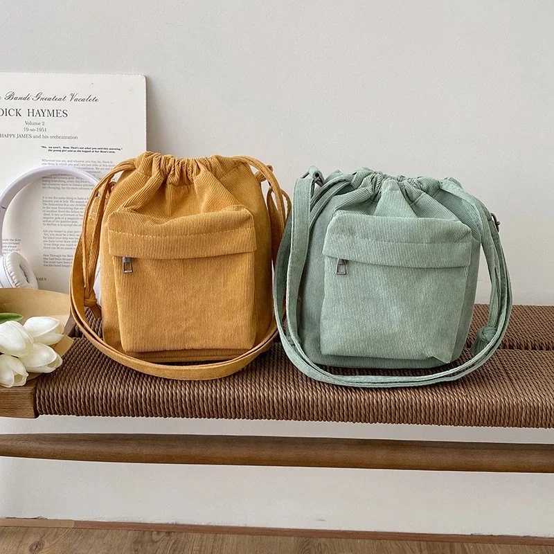 2024 New Women Bag Middle Shoulder Bag Korean Style Drawstring Bucket Bag Casual Light Youth Crossbody Bag Whole Sale C260406