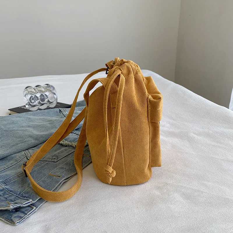 2024 New Women Bag Middle Shoulder Bag Korean Style Drawstring Bucket Bag Casual Light Youth Crossbody Bag Whole Sale C260406