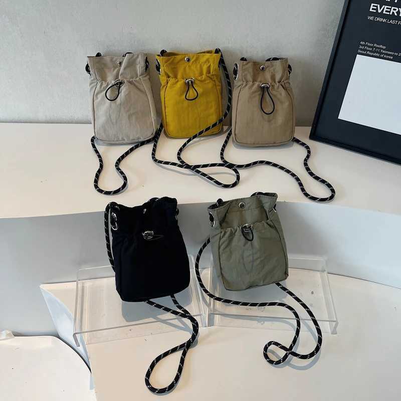 Minimalist Style Lightweight Drawstring Canvas Small Bag Versatile Mini Single-Shoulder Crossbody Coin Purse for Mobile Phones C260406
