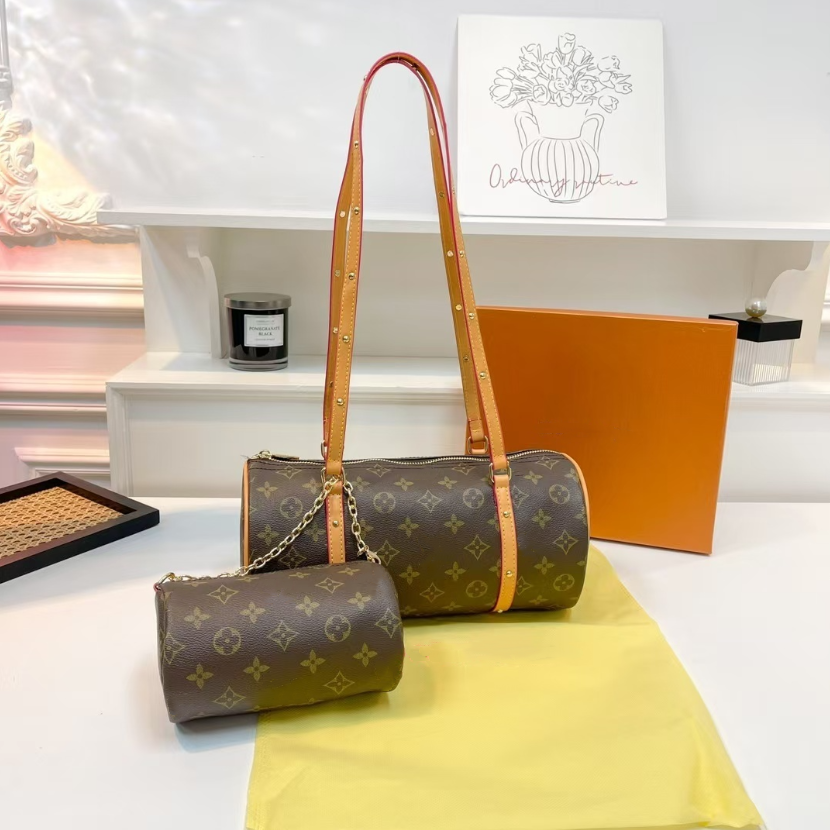 Designer bag 2026 new hobo shoulder handheld pencil armpit bag hand carry retro small cylinder pencil bag pencil women's bag