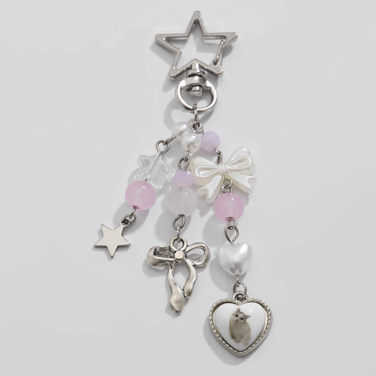 Fresh and elegant sweet and cool strawberry bow keychain. Creative In style flower, star and heart-shaped accessory. X240406