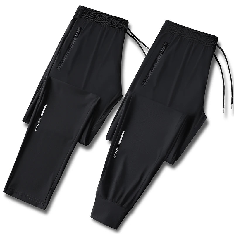 Mens solid color pants summer ice silk elastic quick drying loose sports suitable for casual and business wear M8XL 260407