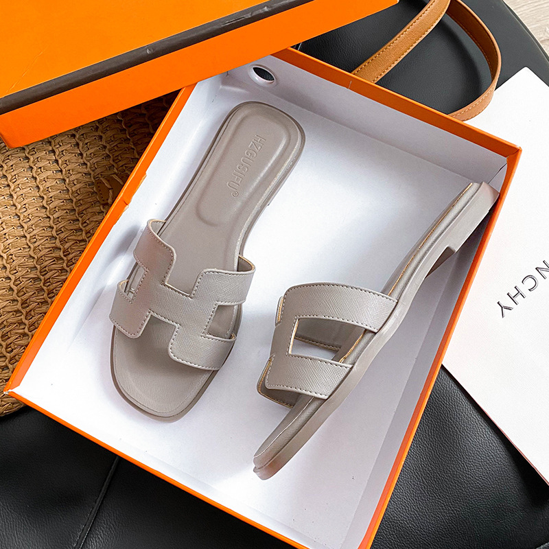 HZGUSIFU Free delivery luxury Slippers Slippers for women's outdoor wear new summer fashion flat bottomed one line dragging beach travel sandals