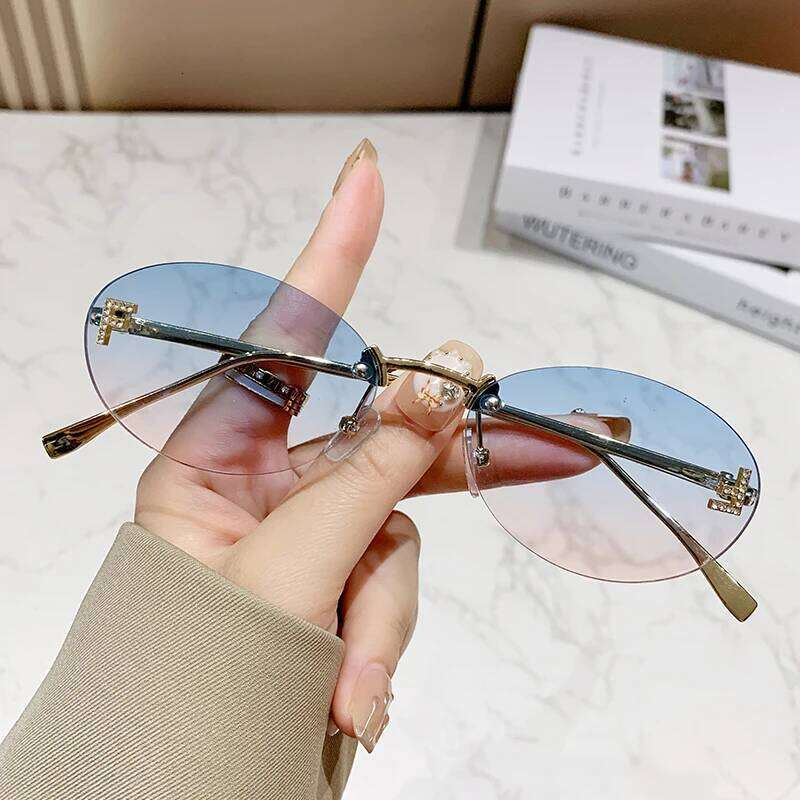 Fashion Brand Rimless Design Sunglasses Female Oval Retro Small Size Metal Suneyeglass Outdoors Casual Vacation UV