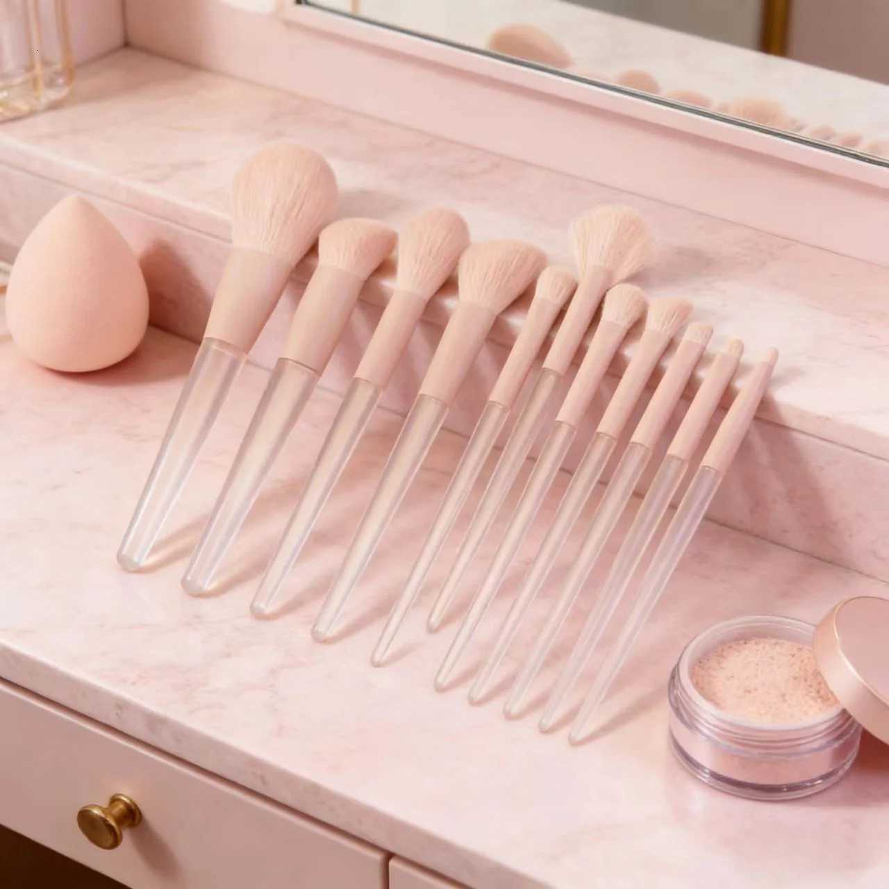 A 12-piece set of pink makeup brushes including powder foundation contouring and eyeshadow tools for makeup application Z260408