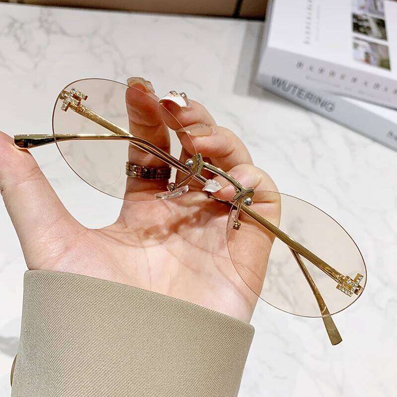 Fashion Brand Rimless Design Sunglasses Female Oval Retro Small Size Metal Suneyeglass Outdoors Casual Vacation UV