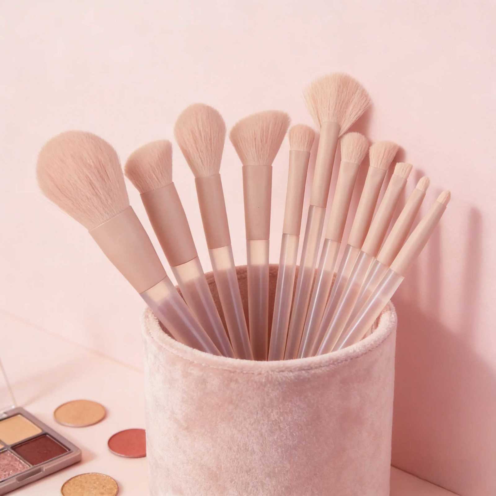 A 12-piece set of pink makeup brushes including powder foundation contouring and eyeshadow tools for makeup application Z260408