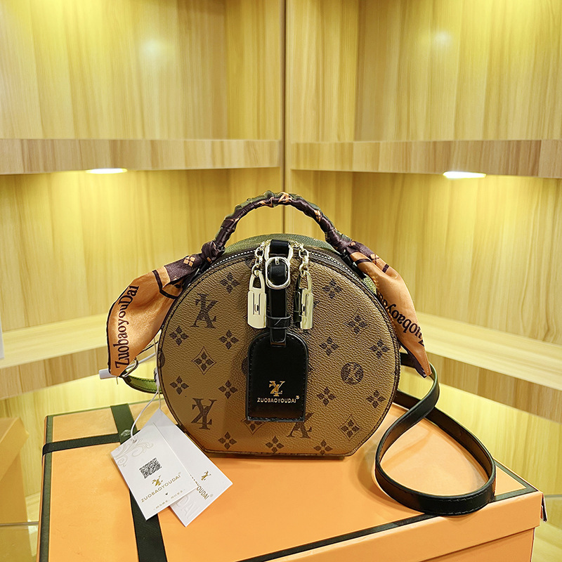 Bags vintage women's 2026 new silk scarf handbag crossbody European and American popular fortune round small bag
