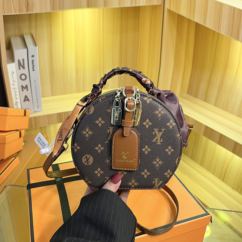 Bags vintage women's 2026 new silk scarf handbag crossbody European and American popular fortune round small bag