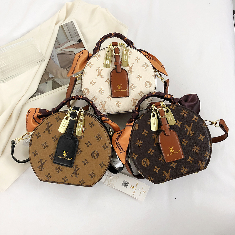 Bags vintage women's 2026 new silk scarf handbag crossbody European and American popular fortune round small bag