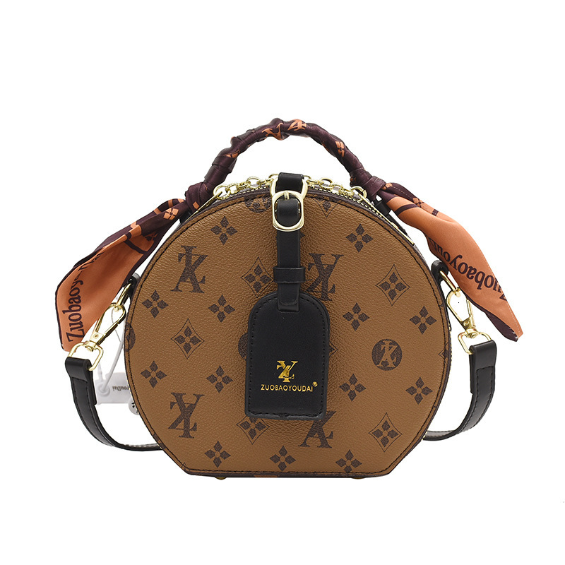 Bags vintage women's 2026 new silk scarf handbag crossbody European and American popular fortune round small bag
