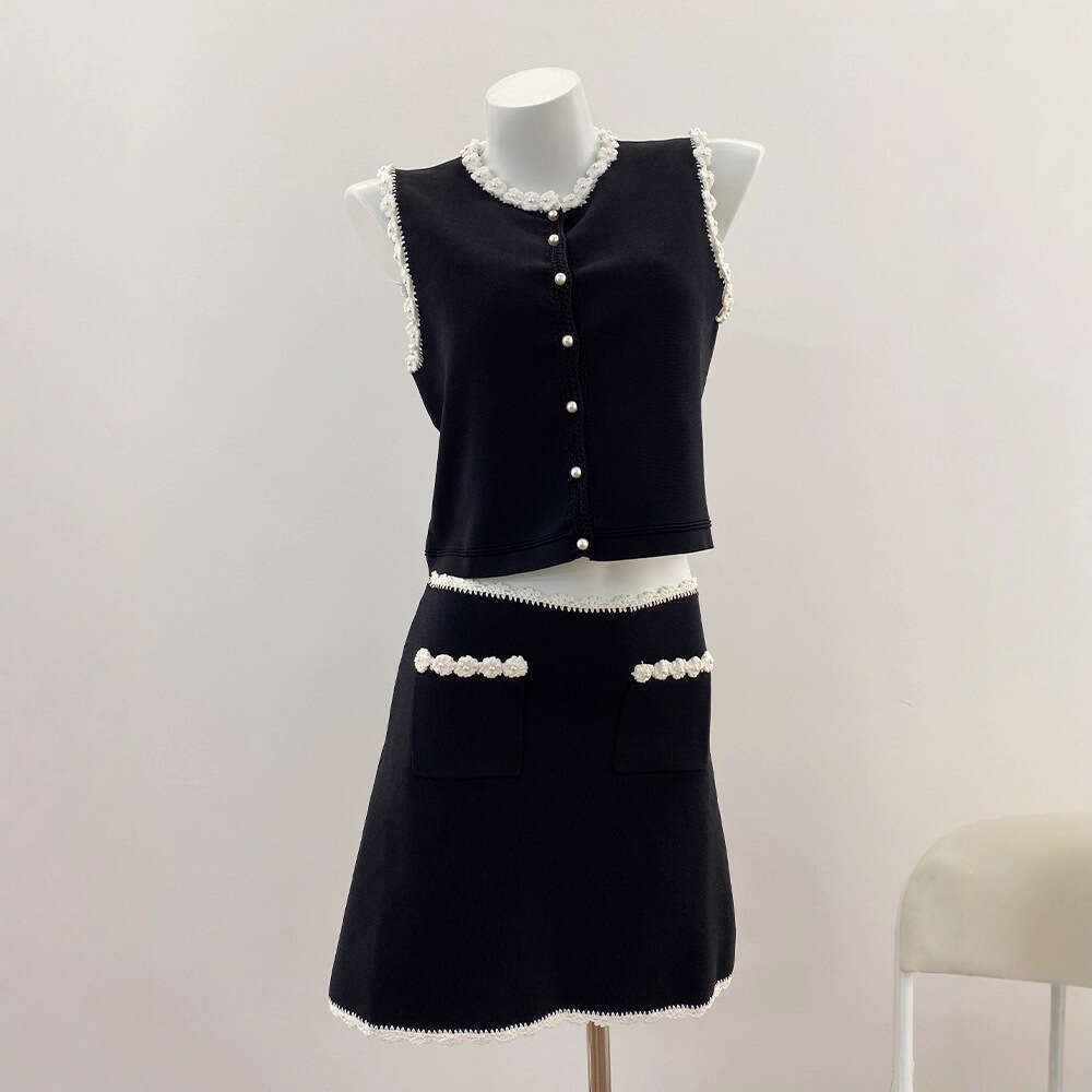 New design for spring and summer of 2026, featuring French aurora style with floral crochet vest and k30 contrasting A-line short skirt