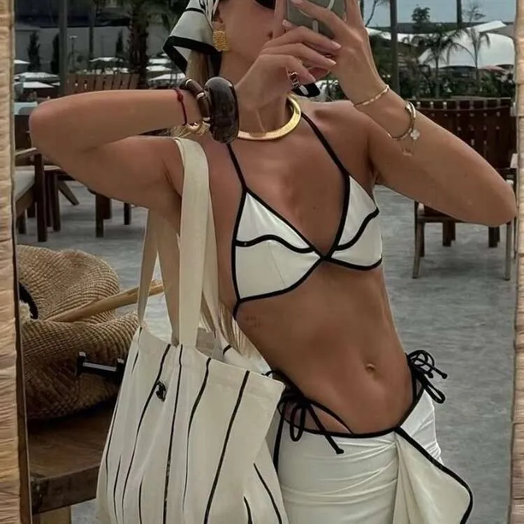 Chic Female Tri-Bikini Ensemble Featuring Belly-Concealing Design & Flowery Trim