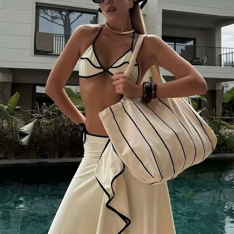 Chic Female Tri-Bikini Ensemble Featuring Belly-Concealing Design & Flowery Trim