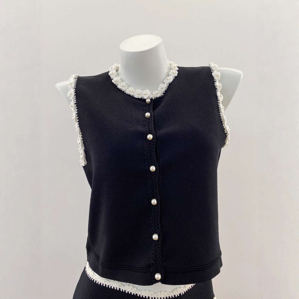 New design for spring and summer of 2026, featuring French aurora style with floral crochet vest and k30 contrasting A-line short skirt