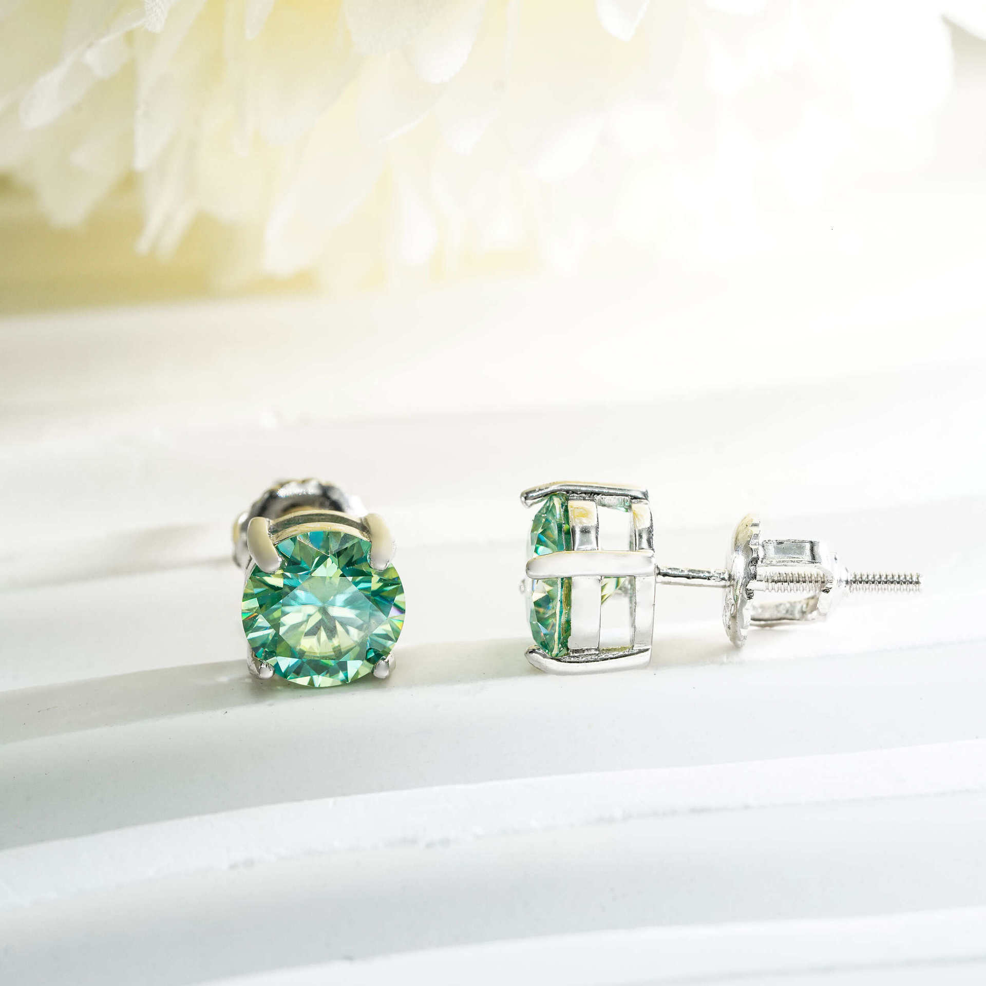 Single stone four-prong blue-green moissanite stud earrings S925 silver unisex available in multiple sizes simple earrings