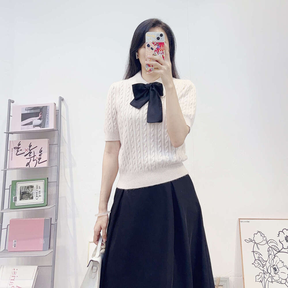 Autumn and winter French ladies elegant k30 and simple POLO collar designer knitted top short sleeved twisted retro wool sweater