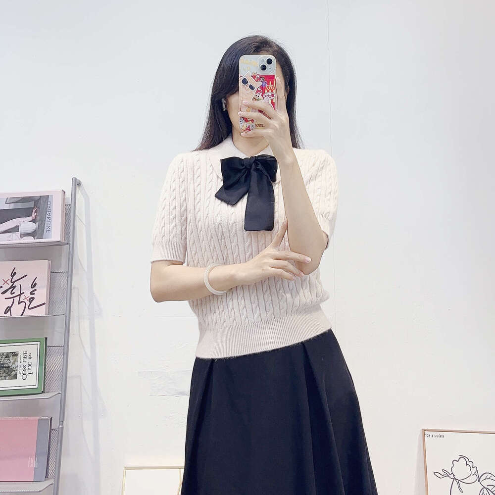 Autumn and winter French ladies elegant k30 and simple POLO collar designer knitted top short sleeved twisted retro wool sweater