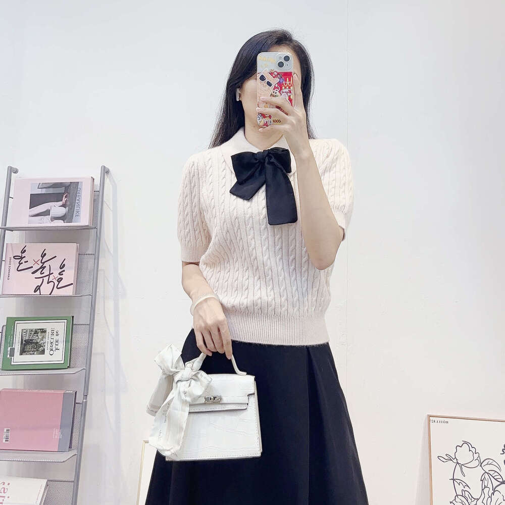 Autumn and winter French ladies elegant k30 and simple POLO collar designer knitted top short sleeved twisted retro wool sweater