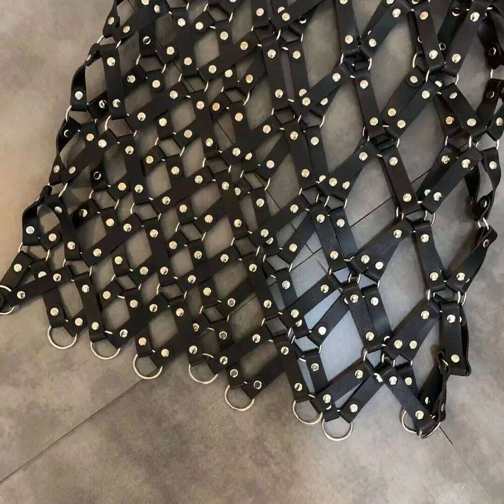 Autumn New Pu Leather Women Sexy Diamond Grid Hollowed Out PU Skirt Outwear Nigh Club Lady Skirts Mini Mujer MAKOUFEI