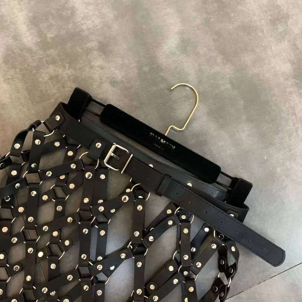 Autumn New Pu Leather Women Sexy Diamond Grid Hollowed Out PU Skirt Outwear Nigh Club Lady Skirts Mini Mujer MAKOUFEI