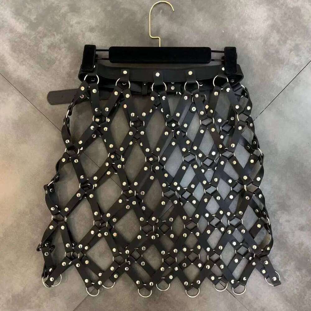 Autumn New Pu Leather Women Sexy Diamond Grid Hollowed Out PU Skirt Outwear Nigh Club Lady Skirts Mini Mujer MAKOUFEI