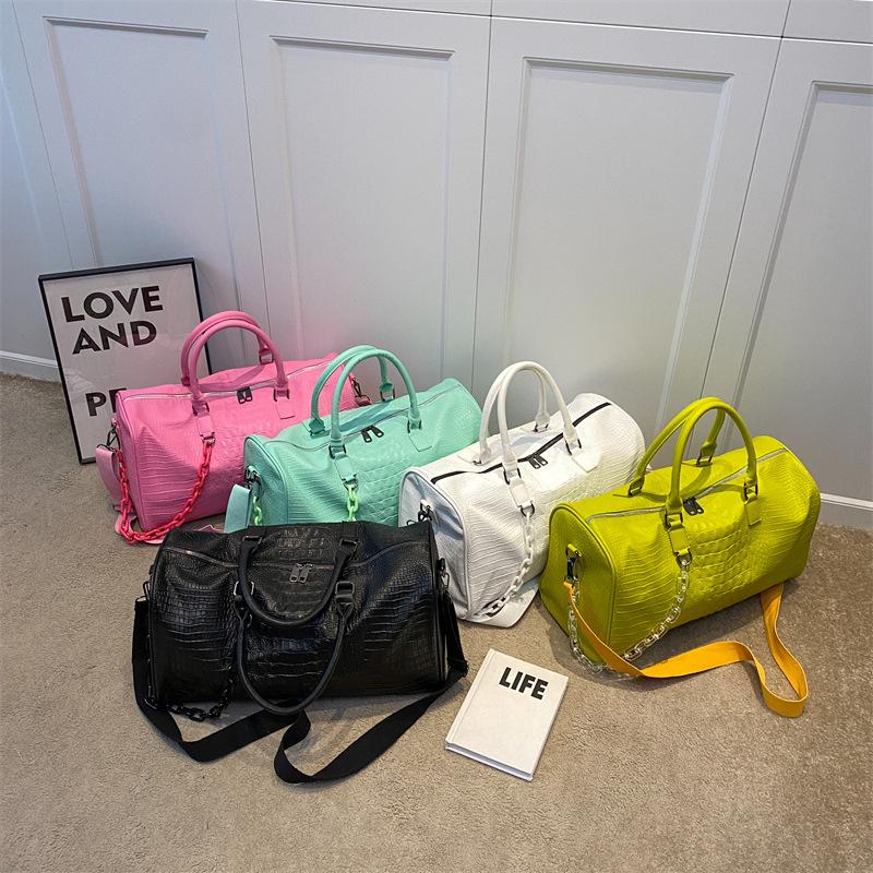 Free Shipping Short Travel Bag Large Capacity Soft Leather Waterproof Fitness Bag New Lightweight Weekend Bag Tide Women