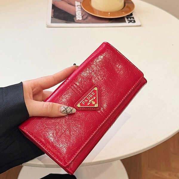 New high-end, stylish versatile clutch bag for women, trendy and simple niche coin purse, popular lightweight long wallet